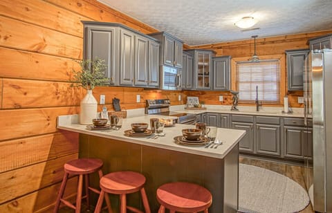 The kitchen with a seating area for 3!