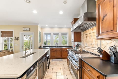 Double oven and overhead hood for all your cooking needs