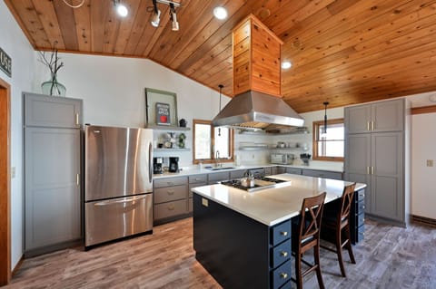 Completely renovated kitchen with Quartz countertops and Wolf Commercial Oven.