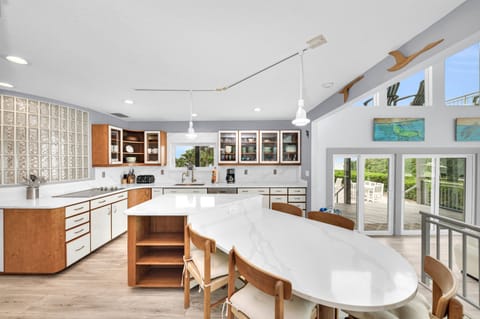 Extra large kitchen with plenty of counter and cabinet space for any host