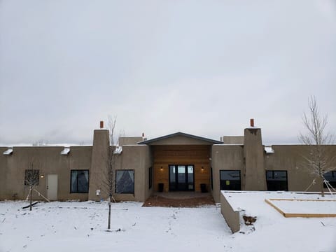 front door (south) with a little snow.