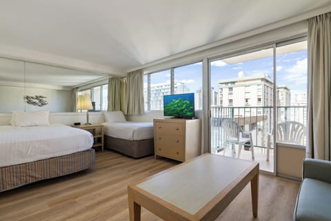 Relax in your bright, modern space with two comfy beds, city views, and your private balcony for morning coffee.