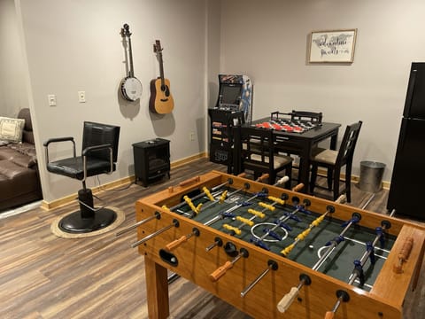 Enjoy the many amenities and games in the gameroom!  Also has add't fridge!