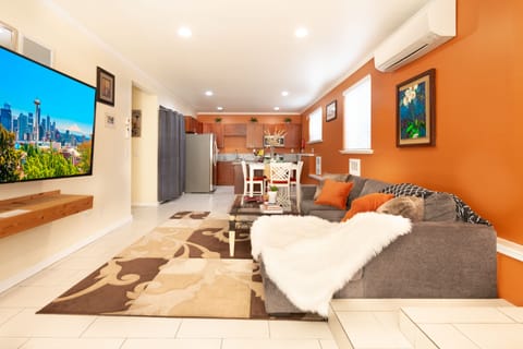 Open space living room with a full size kitchen and appliances!