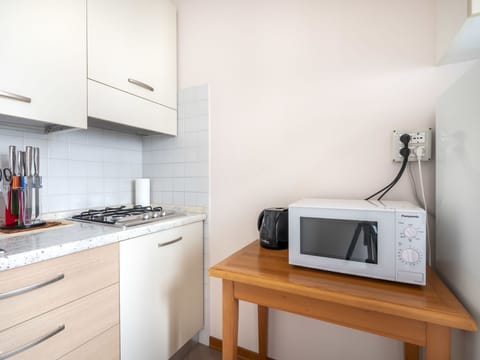 Cabinetry, Furniture, Property, White, Kitchen Appliance, Building, Product, Countertop, Home Appliance, Table