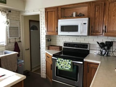 Entering the home into the kitchen.