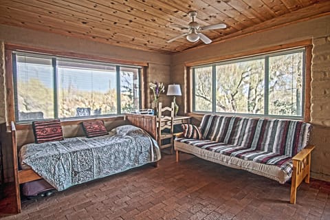 Studio Couch and Spare Bed Area