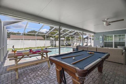 Billiards Table and Picnic Table by the Pool Side
