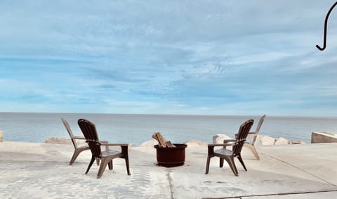 Large patio, firepit, sunrise and sunset views