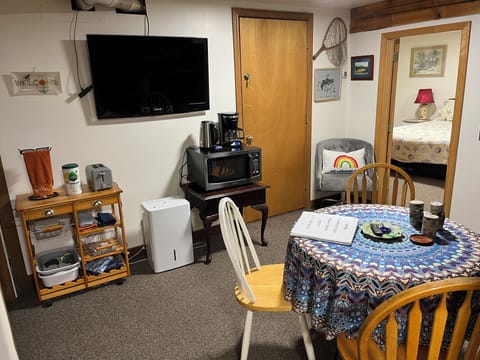 Microwave, coffee pot, water kettle, toaster, and dehumidifier, and TV