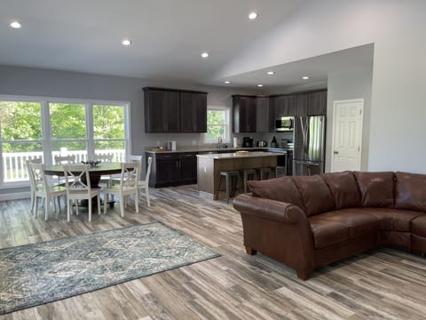 Designer great room, kitchen and dining area built in 2021