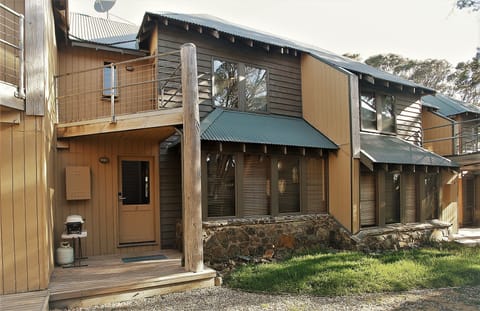 Entrance area/decking with BBQ and grassed area to relax in the cool summer air.