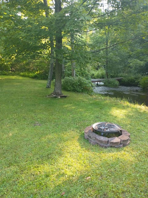Outdoor Firepit Retreat: Gather around the firepit, surrounded by nature’s beauty and tranquility!