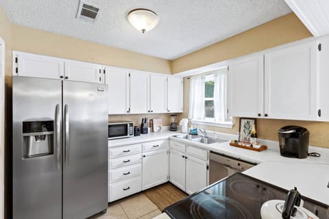 A fully stocked kitchen with stainless steel appliances and everything you need to whip up anything to your heart's content!