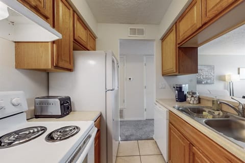 Electric stove, full refrigerator, microwave and Keurig