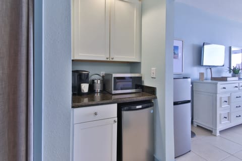 New Keurig coffee maker with coffee pods for your stay and LG mini microwave 