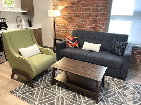 Living room with view of kitchen