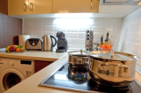 Equipped kitchen of beautiful stone built house short drive to south coast beaches