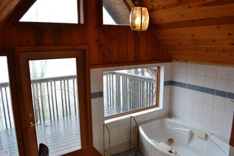 The master bathroom has a stunning view from the jacuzzi tub and shower.