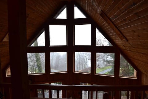 A view from the loft looking out to the golf course during a snow storm.