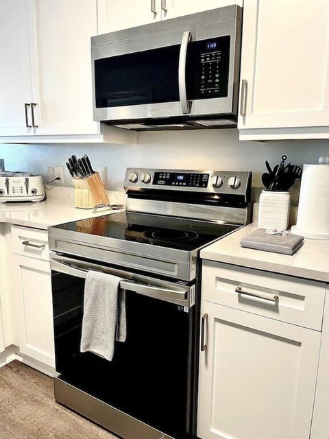Kitchen with stainless steel appliances Oceanview, 202 Isle of Palms, SC | IOP Escapes