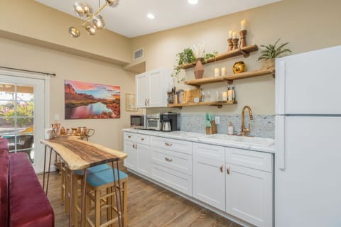 Full Size Fridge, pots, pans, bakeware & all that you need for an extended stay.