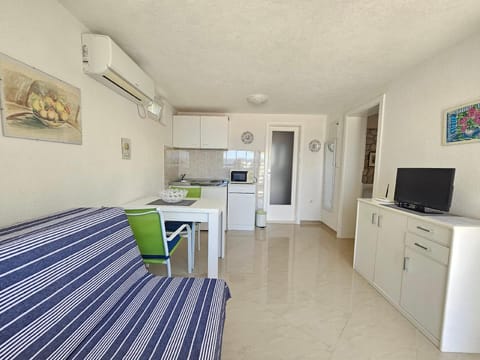 couch for one person, dining area