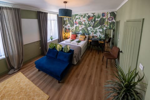 Our chic botanical-themed studio offers the perfect space for work, relaxation, and discovery.