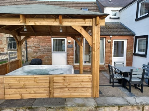 Hayloft patio with hot tub
