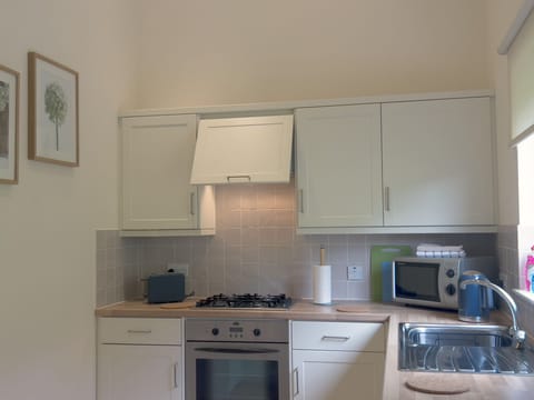 Begin your day in our well-equipped kitchen, featuring modern appliances to brew coffee, prepare breakfast, and embrace the day’s adventures.