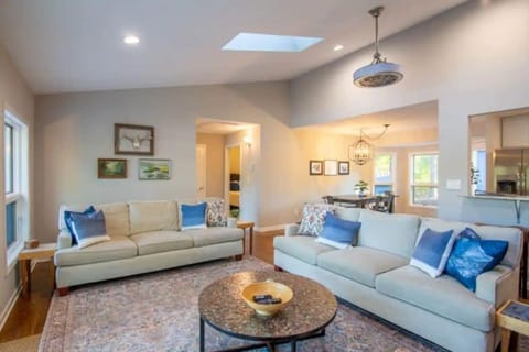 Slider to the deck for warm days and wood-burning stove for cool nights.