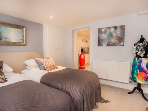 Super-king bed split to create two singles
