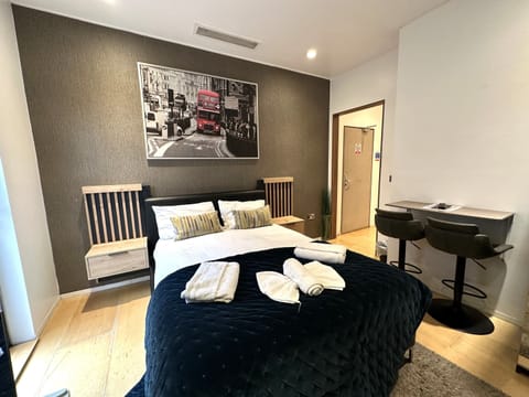 A double room with private bathroom and balcony, featuring a standard double bed for comfort.