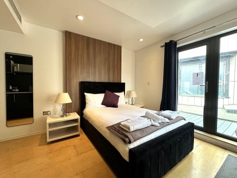 A studio featuring a private bathroom, kitchen, balcony, and a comfortable room for your stay.