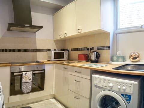 Shared Kitchen in the center of the Building for Guests use