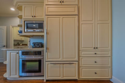 Cabinet themed refrigerator