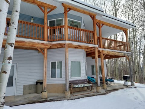 This is the back of the house . The lower level is the guest quarters. 
