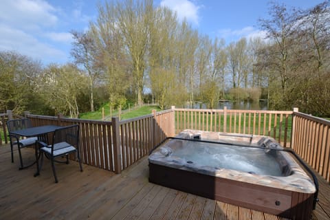 Private veranda with hot tub, BBQ & lake view