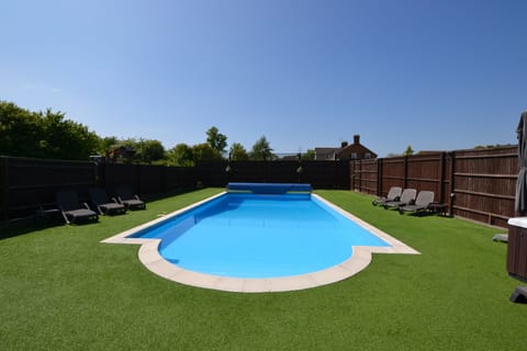 Seasonally heated outdoor private swimming pool (Exclusive to The Pool House)