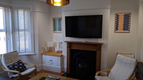 Lounge, Large Television, Sofa Bed, Netflix, Lots Of Chairs And A Desk Area For Work Or Entertaining