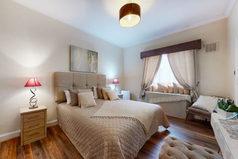Light-filled master bedroom with plenty of storage