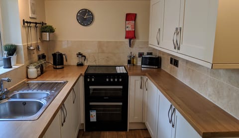 Kitchen - Double Oven, Microwave, Fridge Freezer, Pots & Pans, Glassware, Crockery, Cafetiere.   Kitchen Essentials, Complementary Tea, Sugar, Instant & Ground Coffee and a selection of Cereals and Breakfast Items