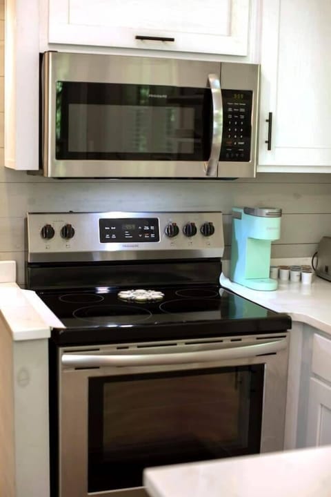 Stove and microwave ready for all your comfort meals.