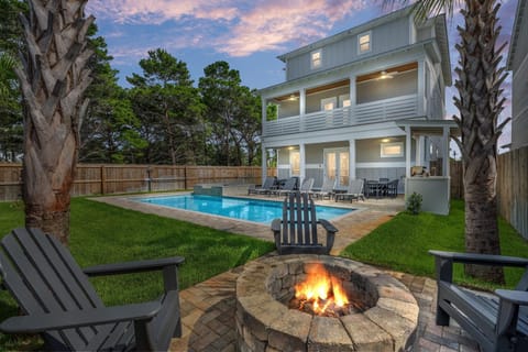 Backyard Pool Area With Firepit