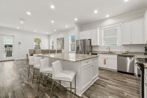 Spacious Kitchen with Large Island Bar On 1st Floor