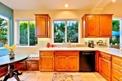 Seating nook, bar seating for 2, opens to family room & leads to dining room