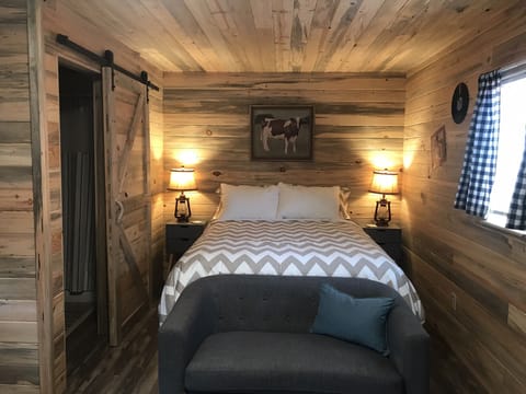 Sleeping area with queen bed