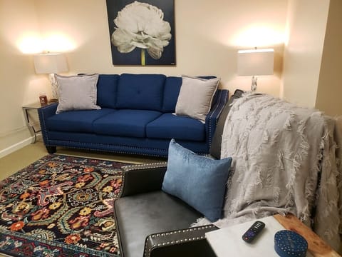 Living room with sofabed and recliner