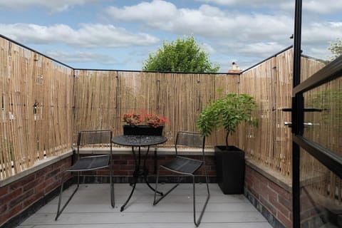 Private outdoor terrace is perfect for a morning cup of tea or a glass of wine before bed