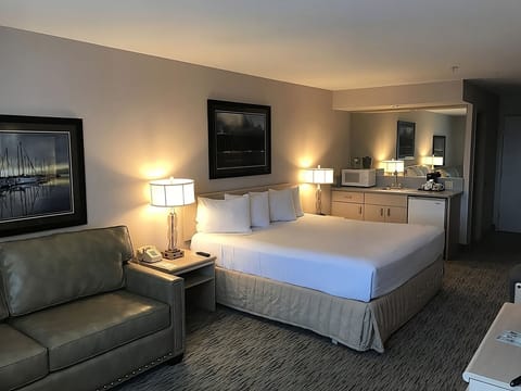 Recharge in a cozy room with convenient in-room refreshments.